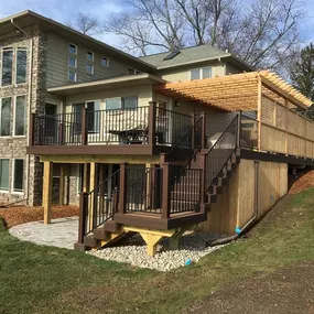 This luxurious multi-level deck in Commerce Charter Twp, MI, was custom-built by Cedar Works to elevate outdoor living.