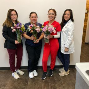 Dr. Jennifer Mai celebrating mothers day at her dental office in tomball