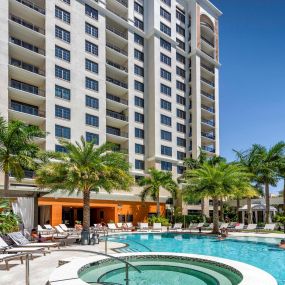 Visit the pool and feel like you are in the tropics with breezy palm trees, hot tub, and private cabanas at Camden Central Apartments in St. Petersburg, FL.