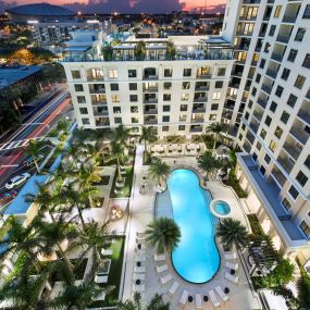 View of the pool and Central Avenue at Camden Central Apartments in St. Petersburg, FL.