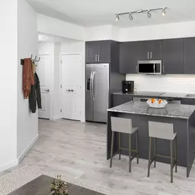 Kitchen in studio floor plan at Camden Central high-rise apartments in St. Petersburg, FL