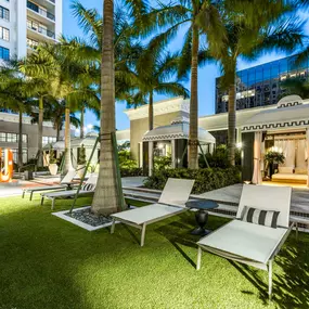 Lovely cabanas and pool loungers at dusk at Camden Central Apartments in St. Petersburg, FL.