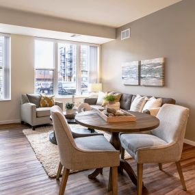 Dining Area and Living Room at Bren Road Station Apartments