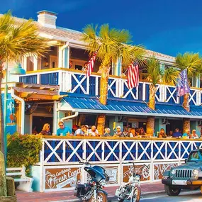 Flagler Tavern, just steps from the beach, features Flagler Avenue's only double decks to enjoy a meal, a beverage and people watching, in New Smyrna Beach, FL