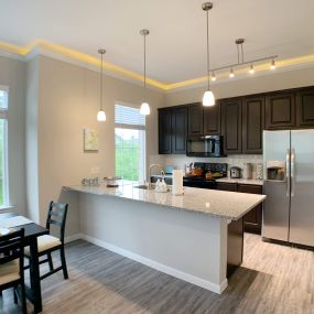 Well-Organized Kitchen with Granite Countertops