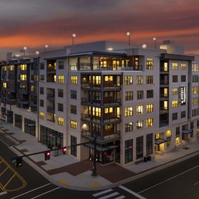 View of Roxboro St. and Dillard St. intersection with night view of Sky Lounge