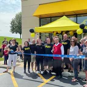 Tuffy Staff Celebrates The Grand Opening Of The New Building.