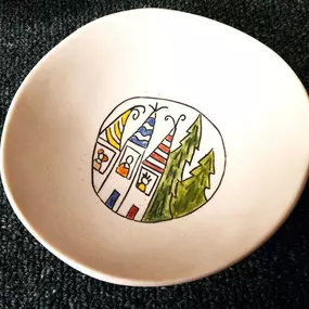 Story bowls by Connie Turin provide a few images on both the inside and outside of her pottery. The colorful drawings give the viewer an opportunity to creatively imagine a story to go with them. Vermont Artisan Designs has a few of these for you to practice on.