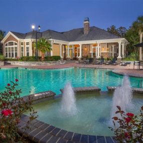 Resort Style Swimming Pool with Poolside Grilling Area and Spacious Sun Deck at Courtney Bend Apartment Homes