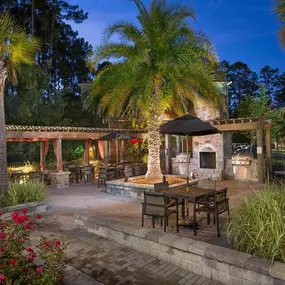 Enjoy Our Pool Deck with Patio and Chairs at Courtney Bend Apartment Homes