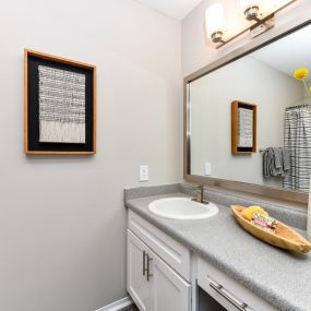 Spacious bathroom with large vanity at 15Seventy