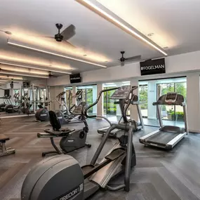 Renovated fitness studio with cardio and weight lifting equipment at 15Seventy