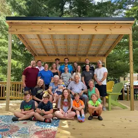 In honor of Grandparents' Day, here is a picture of my family that we took last weekend.  We all got together to celebrate my dad.  He's retiring from State Farm after 47 years.  When we asked how he wanted to celebrate, he told us he wanted us all together.  So that's what we did.  All 23 of us (3 kids with spouses, 11 grandkids and 1 great) spent the long weekend together.  
We did all the things we did as kids.  We had homemade pizza using Dad's recipe, played golf, swam, had Dad's pancakes, 