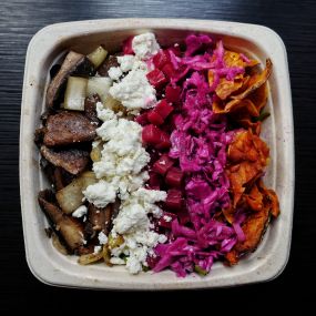 Once Bitten: Grilled portobello with green papaya slaw, goat cheese, beets, sweet potato chips and sage aioli