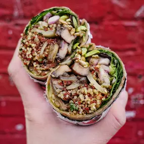 Ghost: Quinoa and sunflower seed wrapped in whole wheat dough with grilled portobello, shallot, edamame, scallion, zatar and citrus sumac vinaigrette. Filled with mixed greens