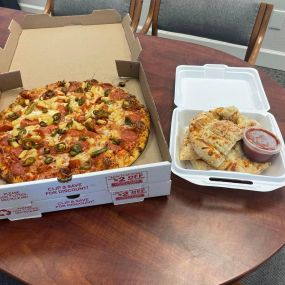 National pizza day means a pizza party in the office. It had to be Louie’s. And of course, we got the cheese bread, IYKYK. Our big game movie poster also got hung up just in time for this weekend!