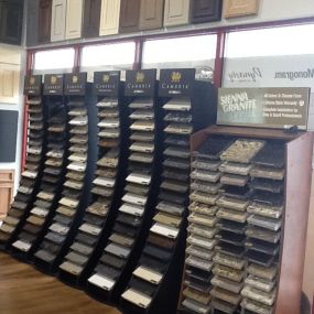 A display of various types granite samples for kitchen countertops and kitchen remodels