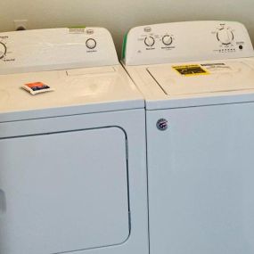 Washer and Dryer room with connections.