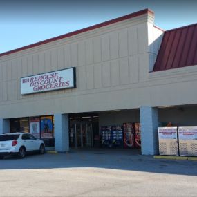 Warehouse Discount Groceries of Arab front entrance on a sunny day. A local family-owned grocery store in Arab AL.