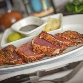 Ahi Filet, spiced with soy, wasabi and pepper rub and lightly seared to perfection.