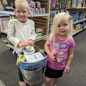 Look at these cuties filling a birthday bucket! Come in 2-3 weeks before your kiddos birthday, fill up the bucket, take a picture, and let friends and family know about the bucket. They can come in OR call to pick a present. We will wrap it up and have it ready. Easy peasy!