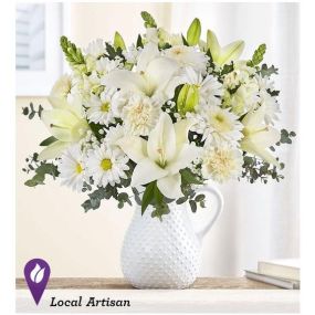 Flower Song™ Bouquet By Southern Living® - Our exclusive arrangement features a pure white floral mix, gathered by hand in our Timeless Treasure pitcher: a piece that inspires nostalgia with its vintage Swiss Dot design, while adding elegance anywhere in the home.