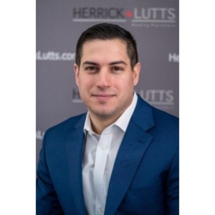 Logo fra Herrick Lutts Realty Partners