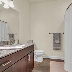 Large Bathroom with Granite Countertops