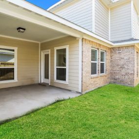 Rear View with Lush Green Space