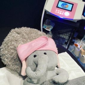 Our store mascot Eli getting a Cryoskin Facial!