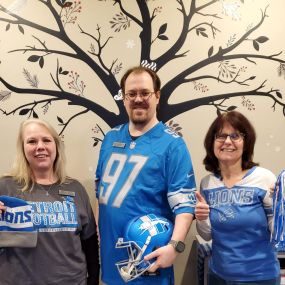 Michigan Eye Institute Employees Wearing Detroit Lions Attire