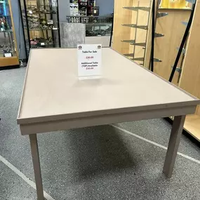 We have some tables and a table top available. Complete tables are $30 and the table top is $20. Dimensions are approximately 4 Ft. 2 In. Wide and 7Ft long.