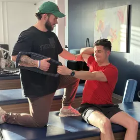 Ian using the spiro to stretch one of our members, Wade.