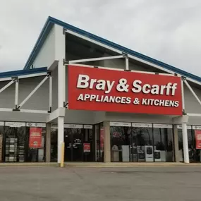 Outside view of the Bray & Scarff appliance store building with a red sign located in Annapolis, MD