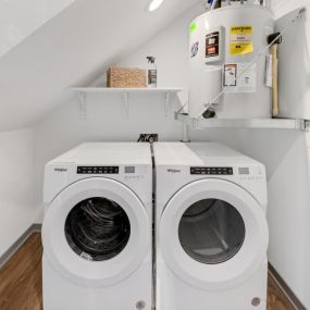 A washer and a dryer in a laundry room