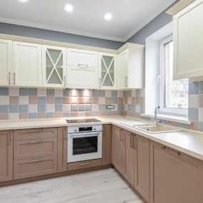 two-toned kitchen after a cabinet color change