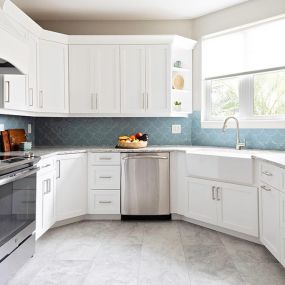 White kitchen cabinets after cabinet painting