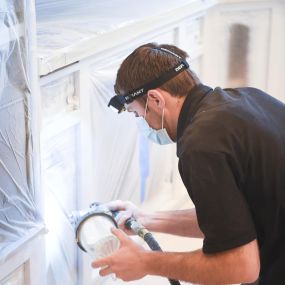 N-Hance technician performing cabinet painting