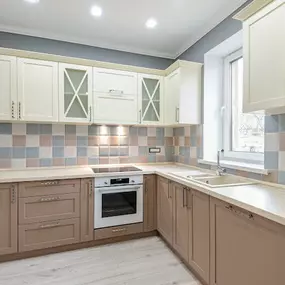 two-toned kitchen after a cabinet color change