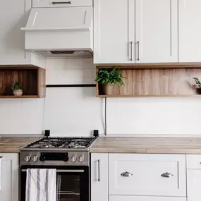 Small kitchen with updated white cabinets