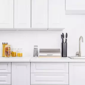 kitchen with white painted cabinets in Duxbury