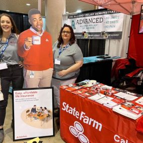 Caleb Hanke State Farm insurance agent and team at a convention Wichita, KS