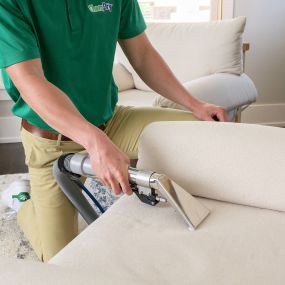 close up of Chem-Dry technician doing an upholstery cleaning