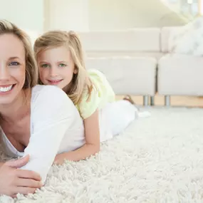 Mom and daughter on the carpet