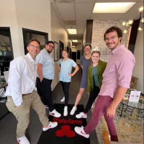 We hit our goals….so I bought matching State Farm colored Nikes for the team!  
Custom designed and delivered today, so we had to take time for a photo opt. 
Cheers to this amazing team!