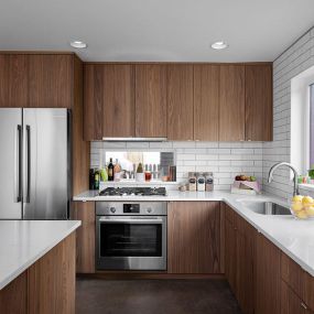 A complete kitchen remodel requires a full gut of the kitchen down to the studs. Everything gets upgraded to code & replaced with new, including the electric & plumbing. The kitchen layout can be changed to any design & style you like including removing walls and creating an open concept.