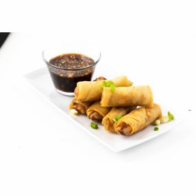 Golden brown and crispy spring rolls with dipping sauce from Urban Wok. The perfect starter!