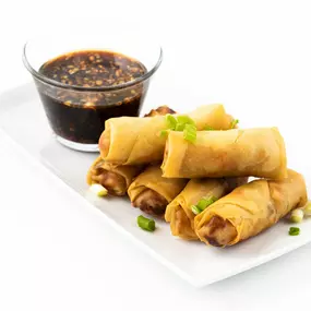 Golden brown and crispy spring rolls with dipping sauce from Urban Wok. The perfect starter!