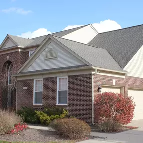 house with new roof installed by Renaissance Roofing Inc.