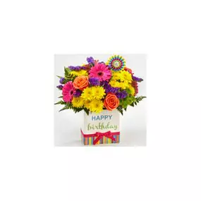 The Birthday Brights Bouquet is a true celebration of color and life to surprise and delight your special recipient on their big day! Hot pink gerbera daisies and orange roses take center stage surrounded by purple statice, yellow cushion poms, green button poms, and lush greens to create party perfect birthday display.